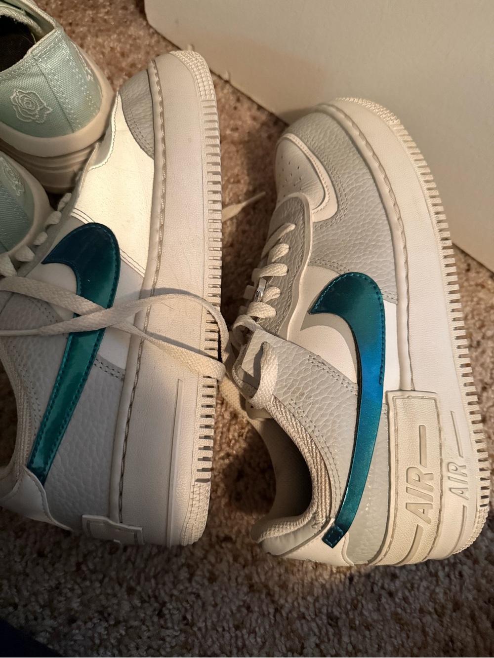 Nike White Sneakers with Teal Blue Swoosh - Women's Athletic Shoes